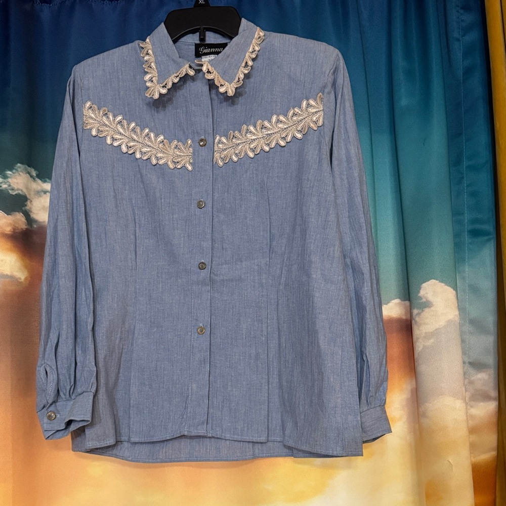 Vintage Blue button-up shirt with elegant lace on the collar, chest, & back.